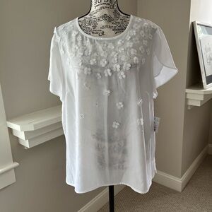 White tulip sleeve with flower appliqués